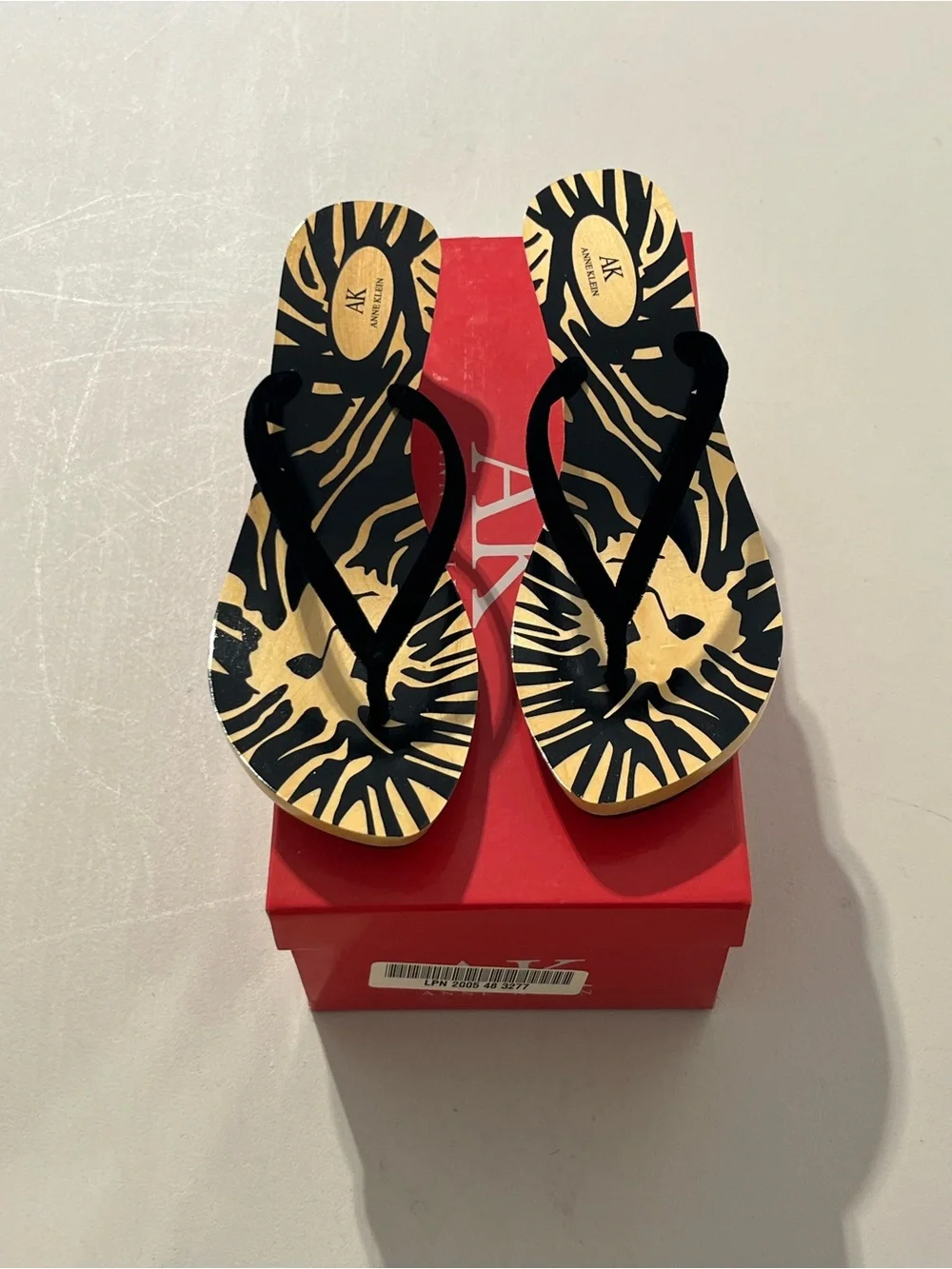 Anne Klein Black & Gold Zebra Flip Flops